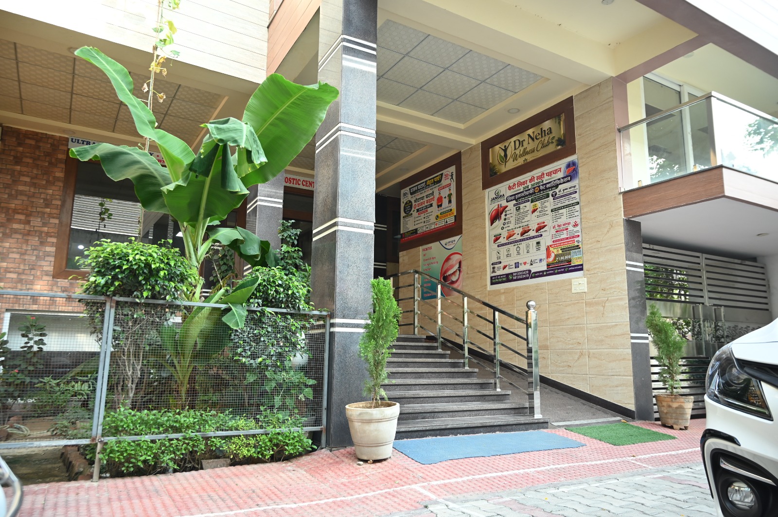 Front exterior facade and entrance stairs of Jangra Diagnostic Centre Rohtak